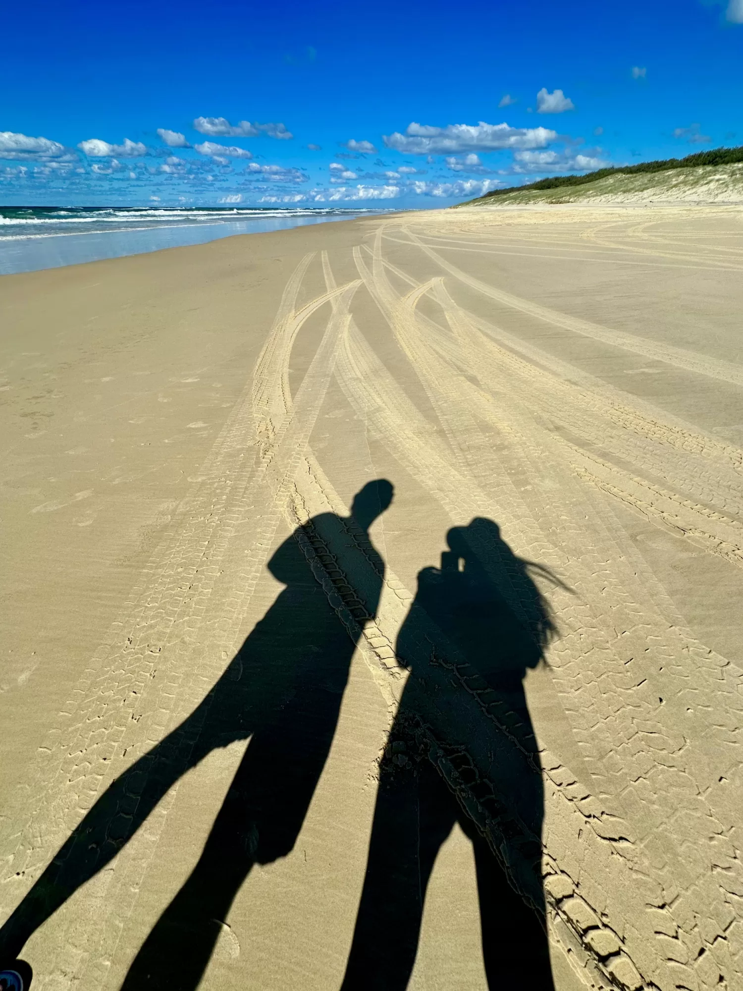 Our shadows at the Beach K´Gari QLD